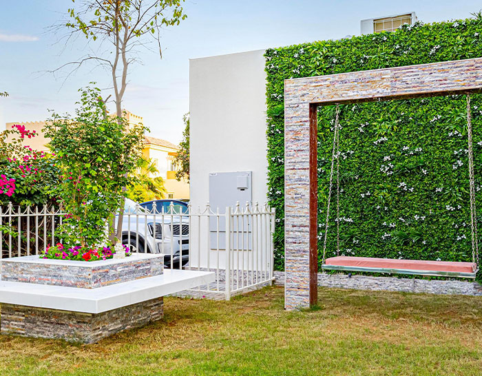 Custom swimming pool features like waterfalls and lighting in Dubai