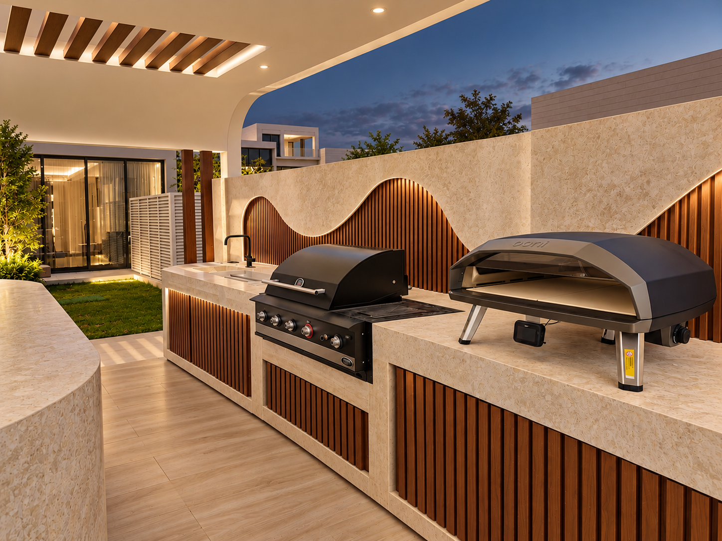 Luxury Dusk Outdoor Kitchen with Pizza Oven